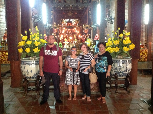 4 Clients from the Philippines are visiting Ba Da pagoda on their north Vietnam tours Hanoi to Halong bay 