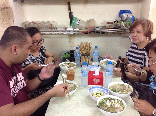 4 Clients from the Philippines are having Bun Thang on their North Vietnam Travel Hanoi to Halong bay