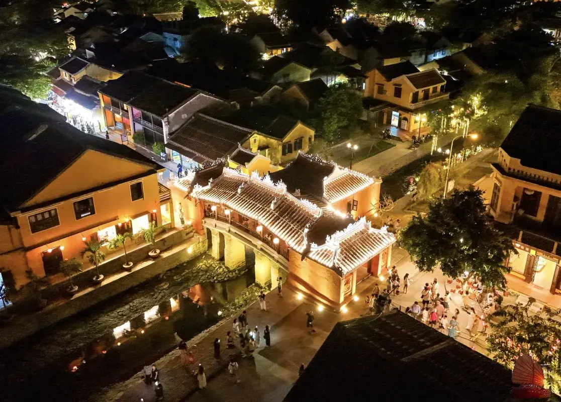 Charming historical streets of Hoi An lit entirely by hundreds of colorful, glowing silk lanterns.