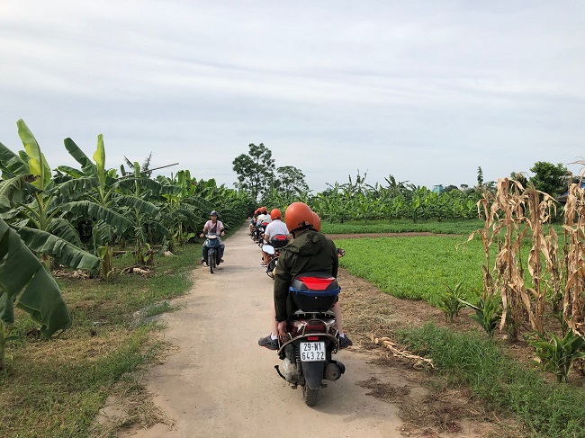 Amazing Vietnam motorbike tour Hanoi countryside - Ninhbinh - Trangan Heritage Site